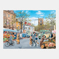 A vibrant market scene with people shopping, ideal for dementia activities like jigsaw puzzles and reminiscence therapy.|market_au_ca_dk_fi_fr_international_ie_it_nl_pt_es_se_gb_us