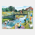 Children play by a stream, perfect for dementia-friendly activities and reminiscence. Ideal for care home engagement and joy.|market_au_ca_dk_fi_fr_international_ie_it_nl_pt_es_se_gb_us