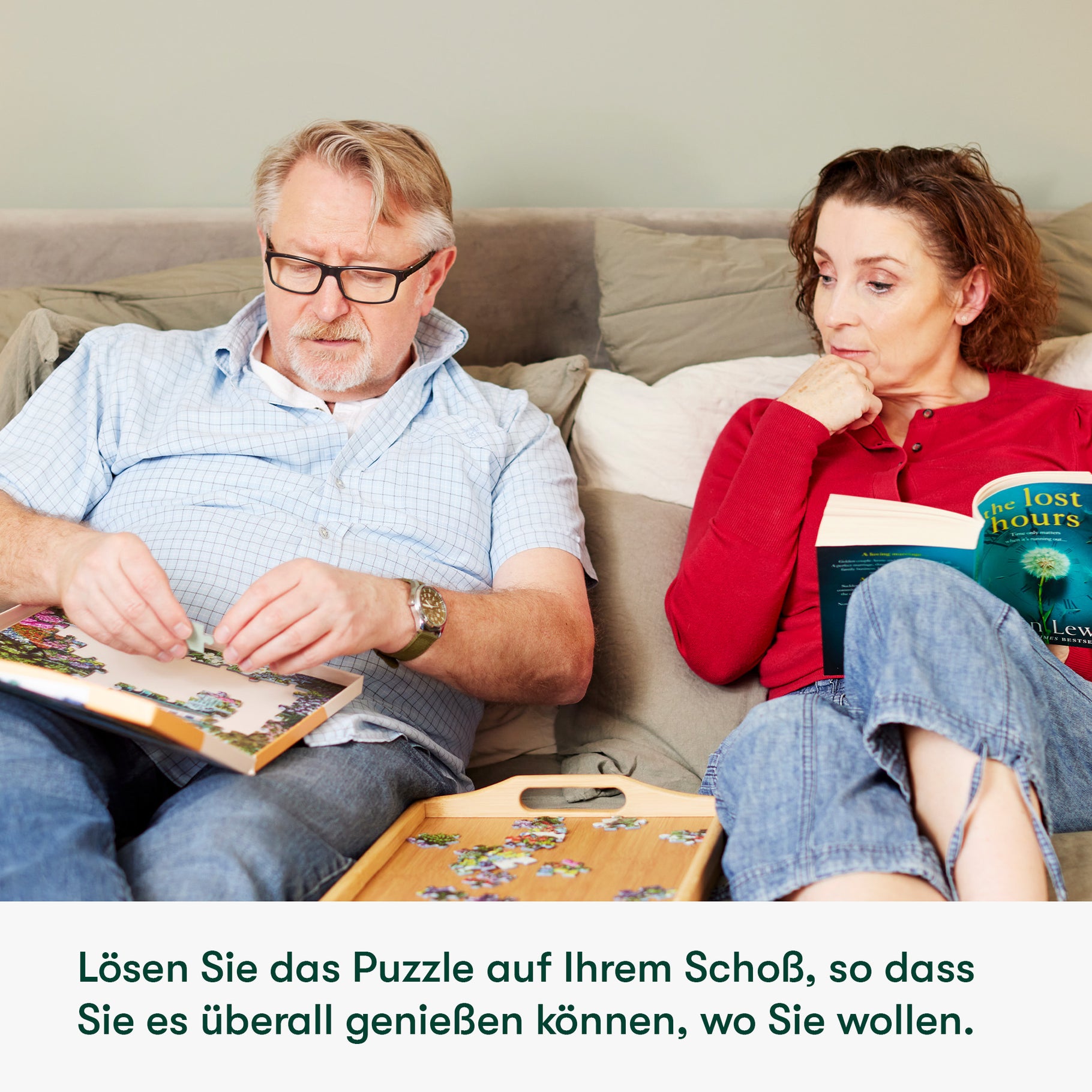 Elderly man enjoys a puzzle, a perfect dementia activity, while a woman reads, showcasing care home activities and products.