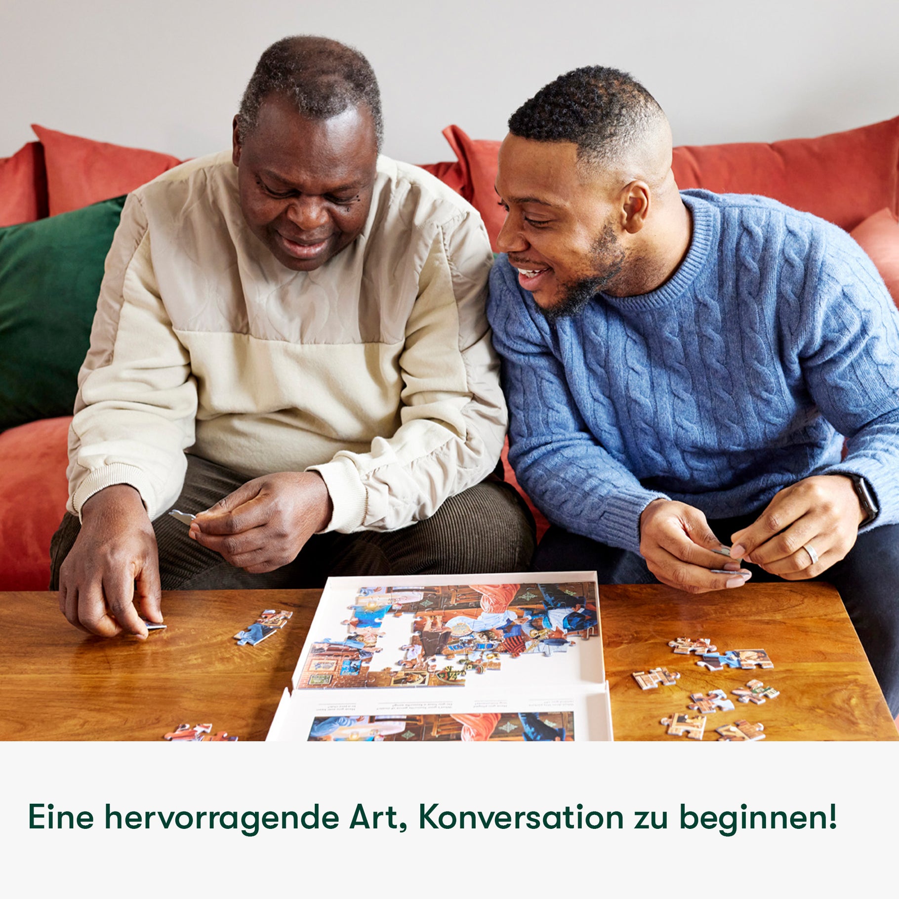 Two men enjoy a puzzle, a perfect activity for dementia patients, promoting engagement and joy in care homes.