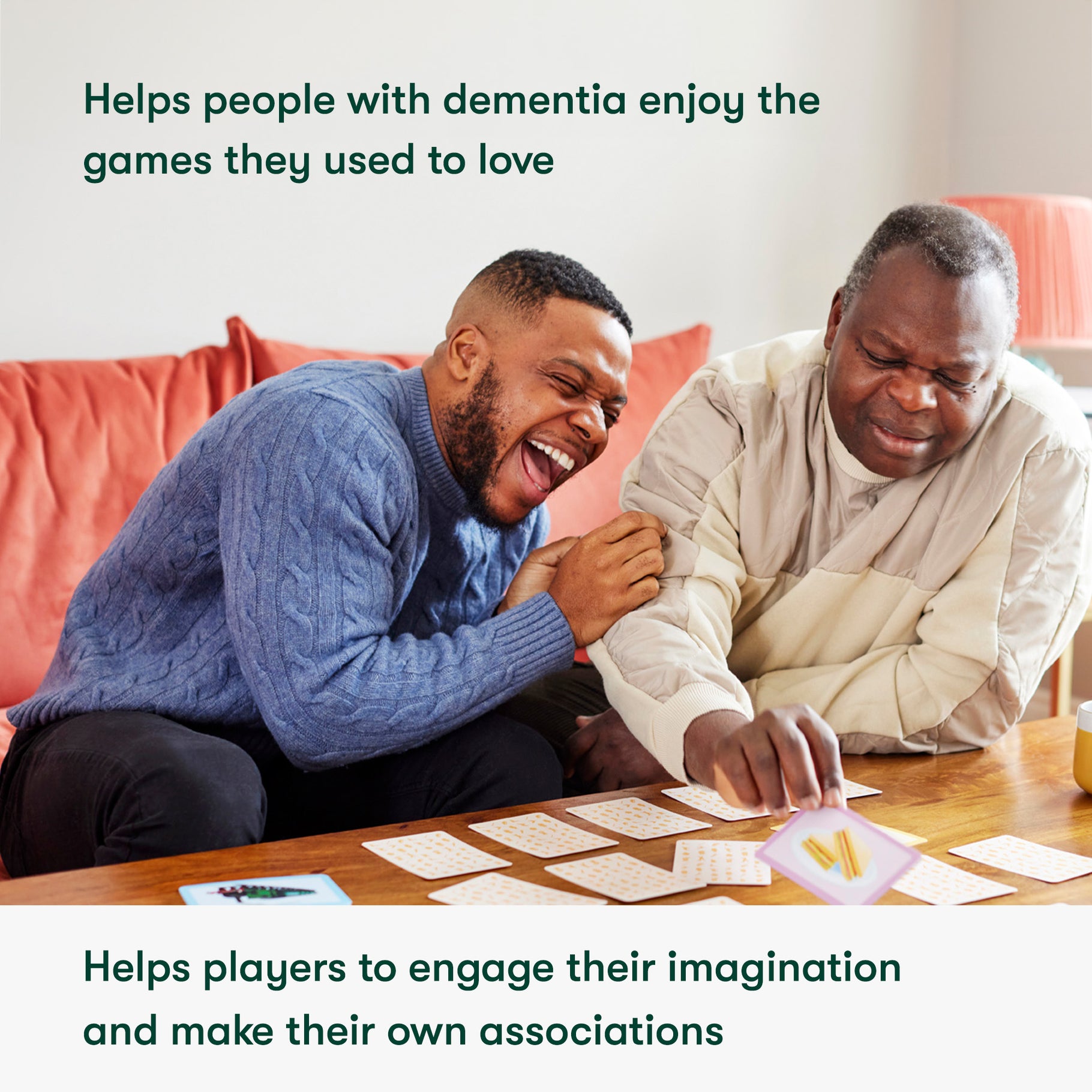 An adult son and father playing a card game