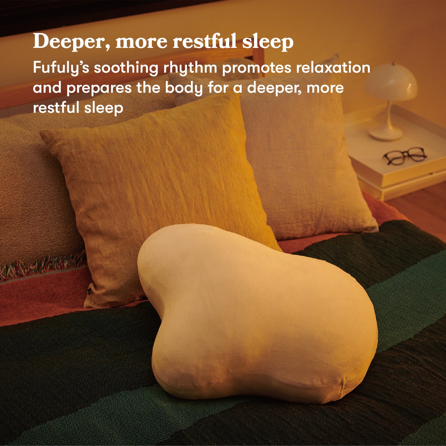 Fufuly calming cushion placed on a bed. Image caption: Deeper, more restful sleep
Fufuly's soothing rhythm promotes relaxation and prepares the body for a deeper, more restful sleep.