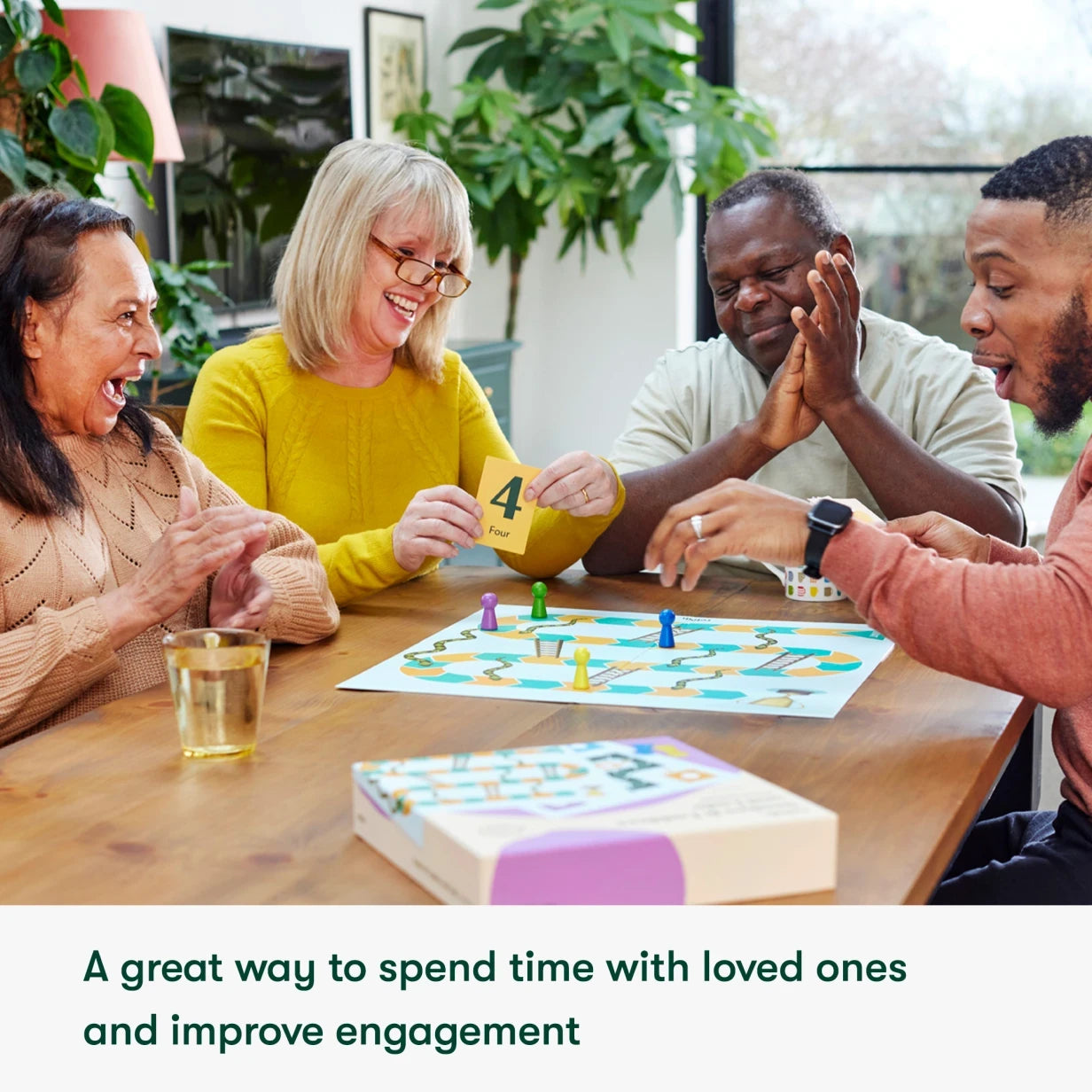 Group enjoying a board game together, promoting engagement for those with Alzheimer's or dementia.