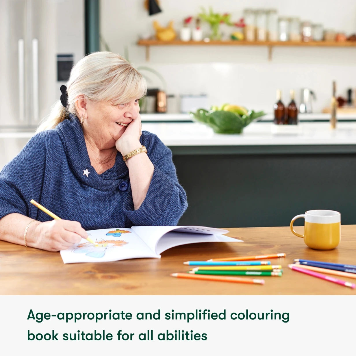 Elderly woman enjoys coloring book, ideal for dementia activities in care homes, promoting engagement and creativity.