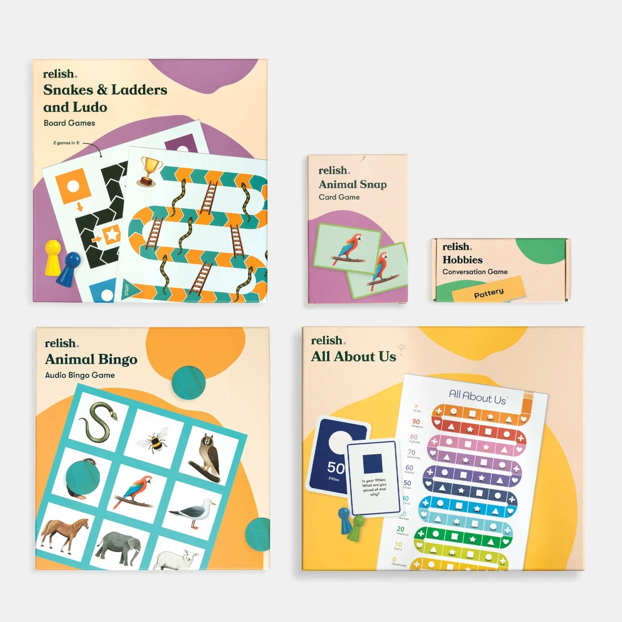 Board games and activities for dementia patients, including Snakes & Ladders, Animal Bingo, and more, ideal for care homes.